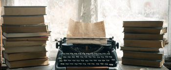 photo of books and typewriter promoting Indie Author Day 