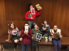 teens holding books